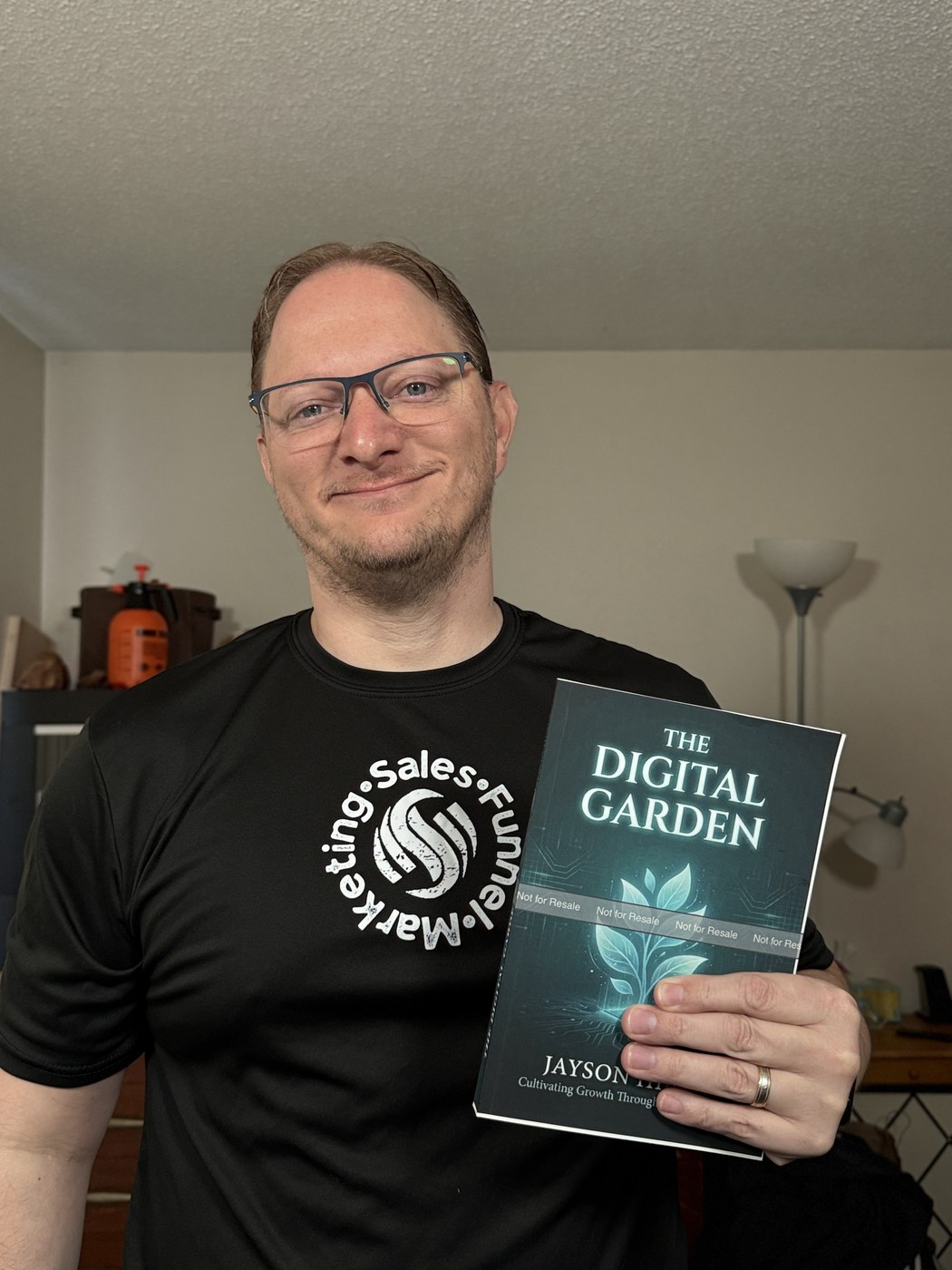Jayson Hines holding The Digital Garden